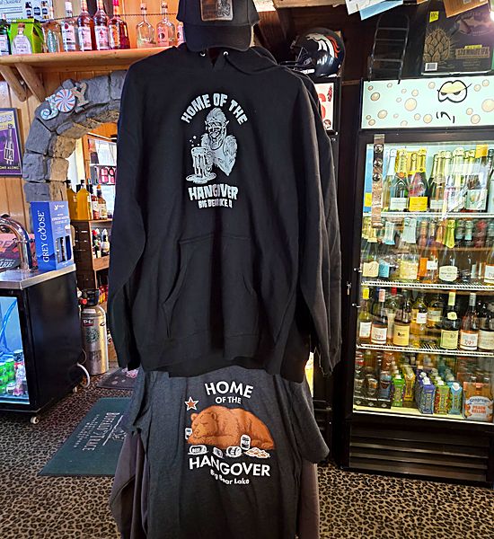 Home of the Hangover hoodies, T-shirts, and hats displayed inside the Big Bear Lake shop