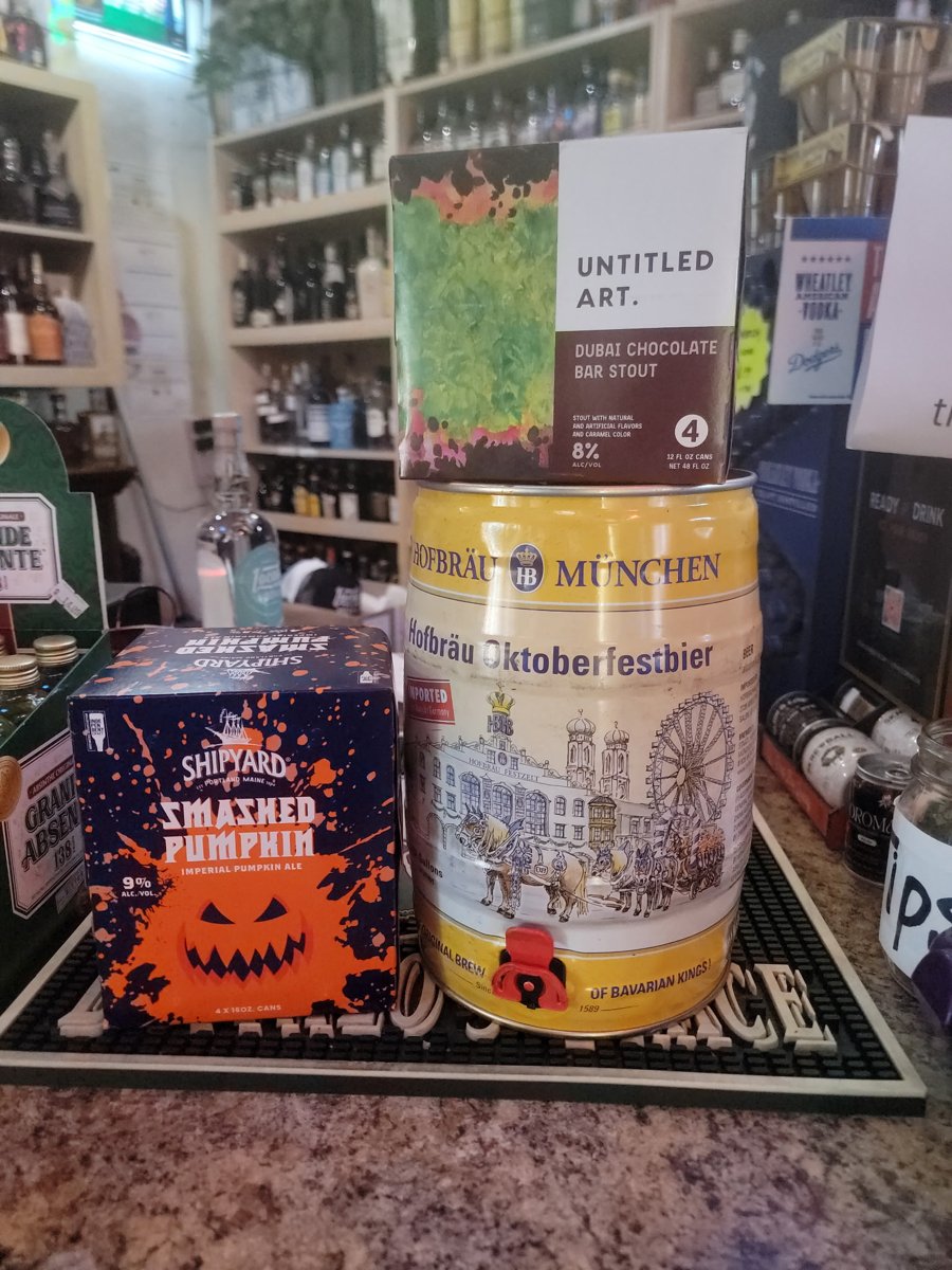Hofbräu Oktoberfestbier, Shipyard Smashed Pumpkin ale, and Untitled Art stout on display