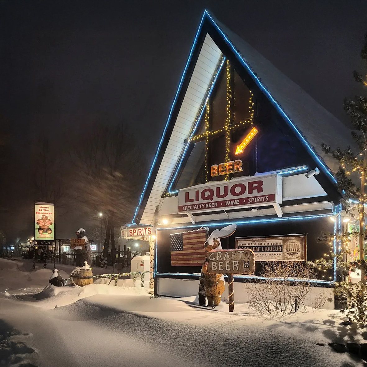 Snowy nighttime exterior of Home of the Hangover in Big Bear Lake